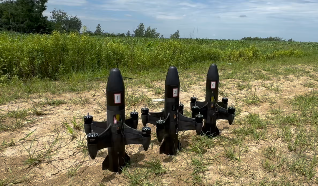Three ReaperRocket Beta-H07 rocket FPV interceptors ready for ground launch